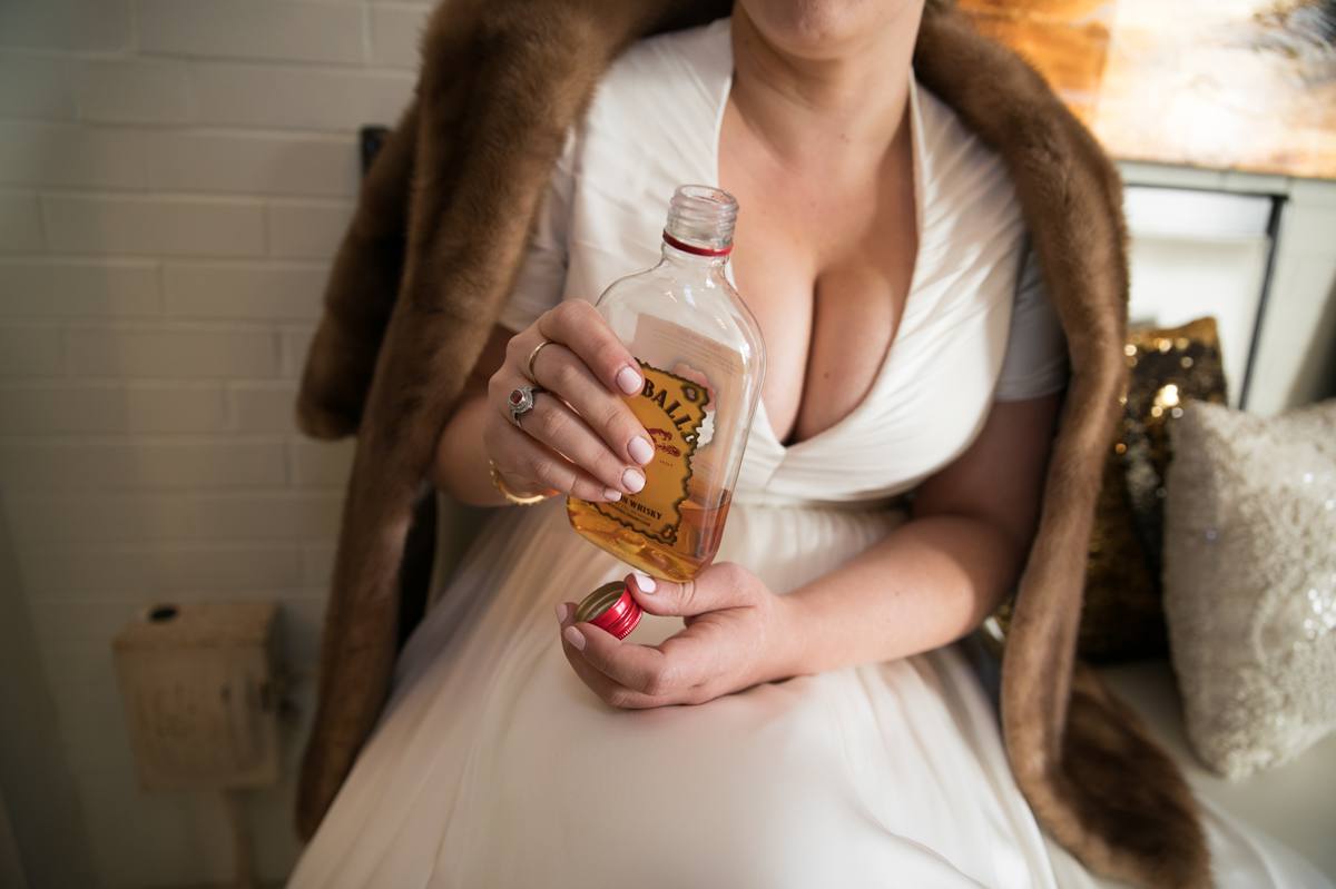 bride with a shot of fireball wiskey