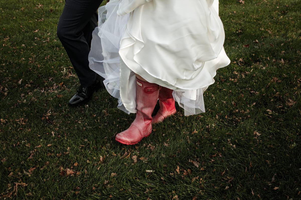 bride in red rubber boots